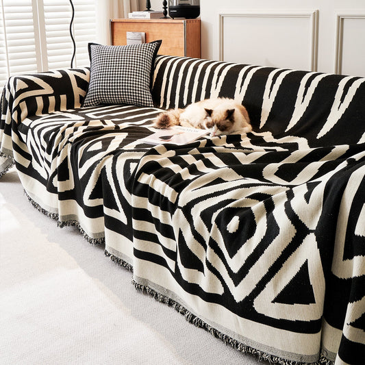 Copridivano d’Ispirazione Boho con Disegni Geometrici e Dettagli Eleganti