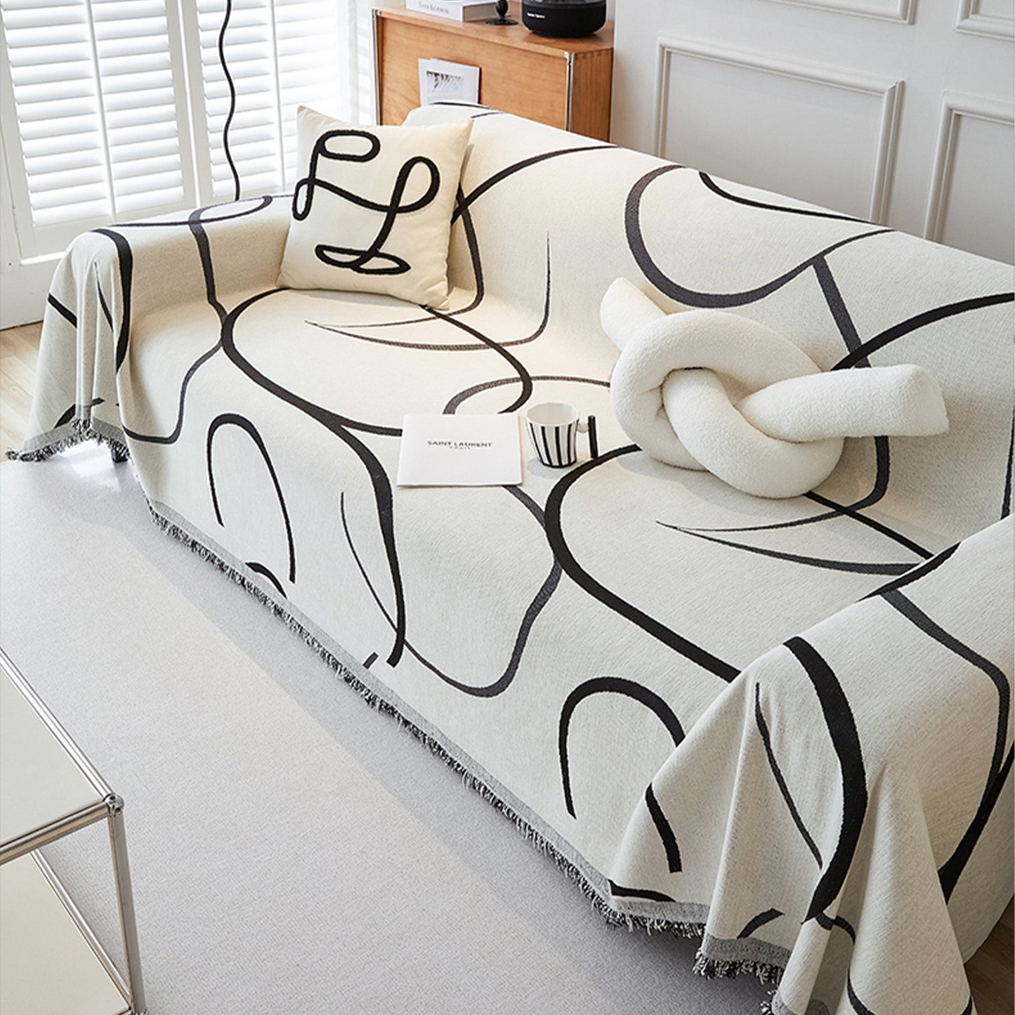 Copridivano d’Ispirazione Boho con Disegni Geometrici e Dettagli Eleganti
