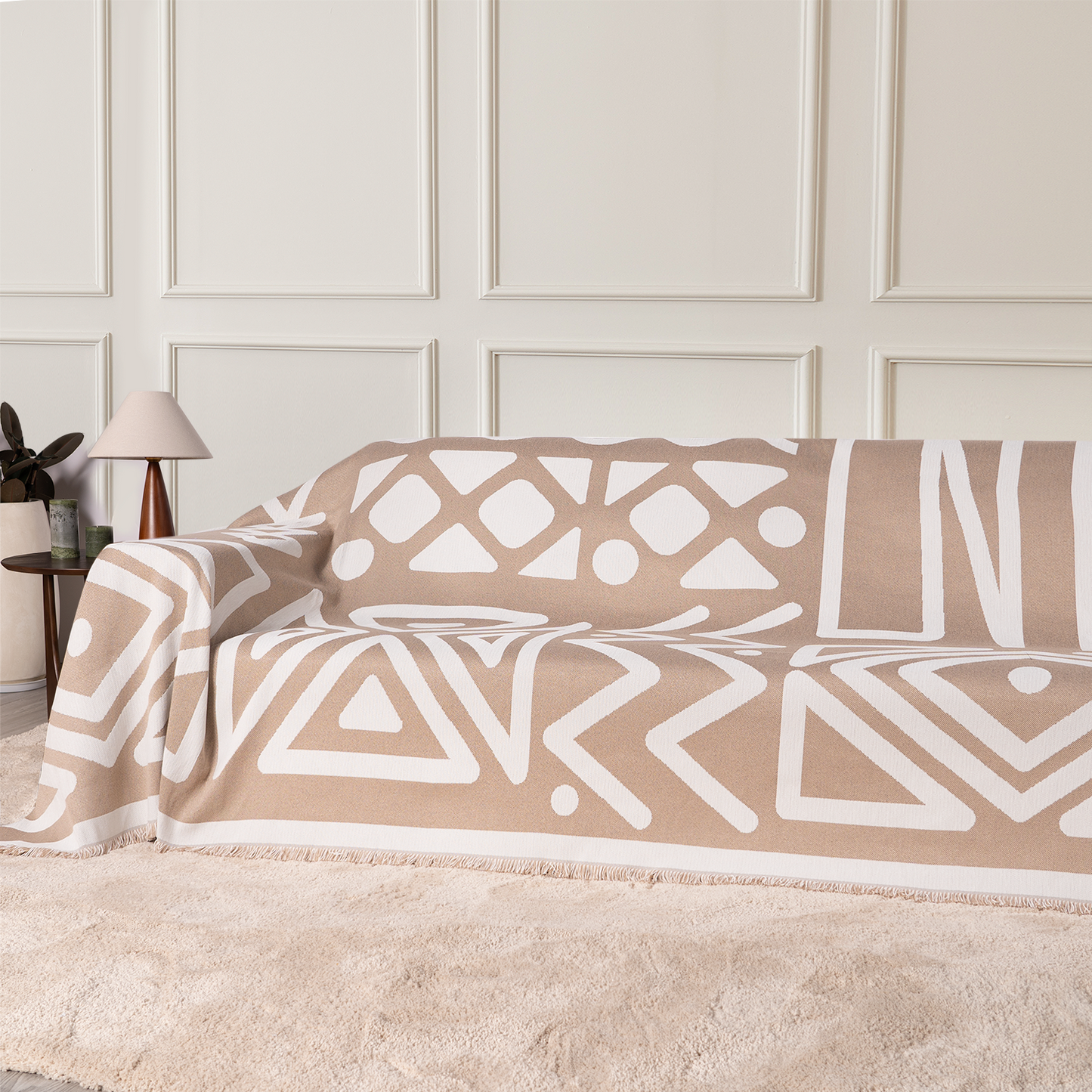Copridivano d’Ispirazione Boho con Disegni Geometrici e Dettagli Eleganti