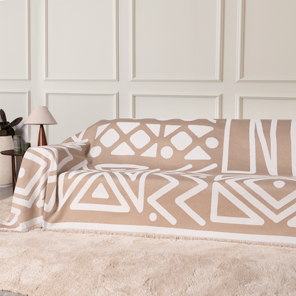 Copridivano d’Ispirazione Boho con Disegni Geometrici e Dettagli Eleganti