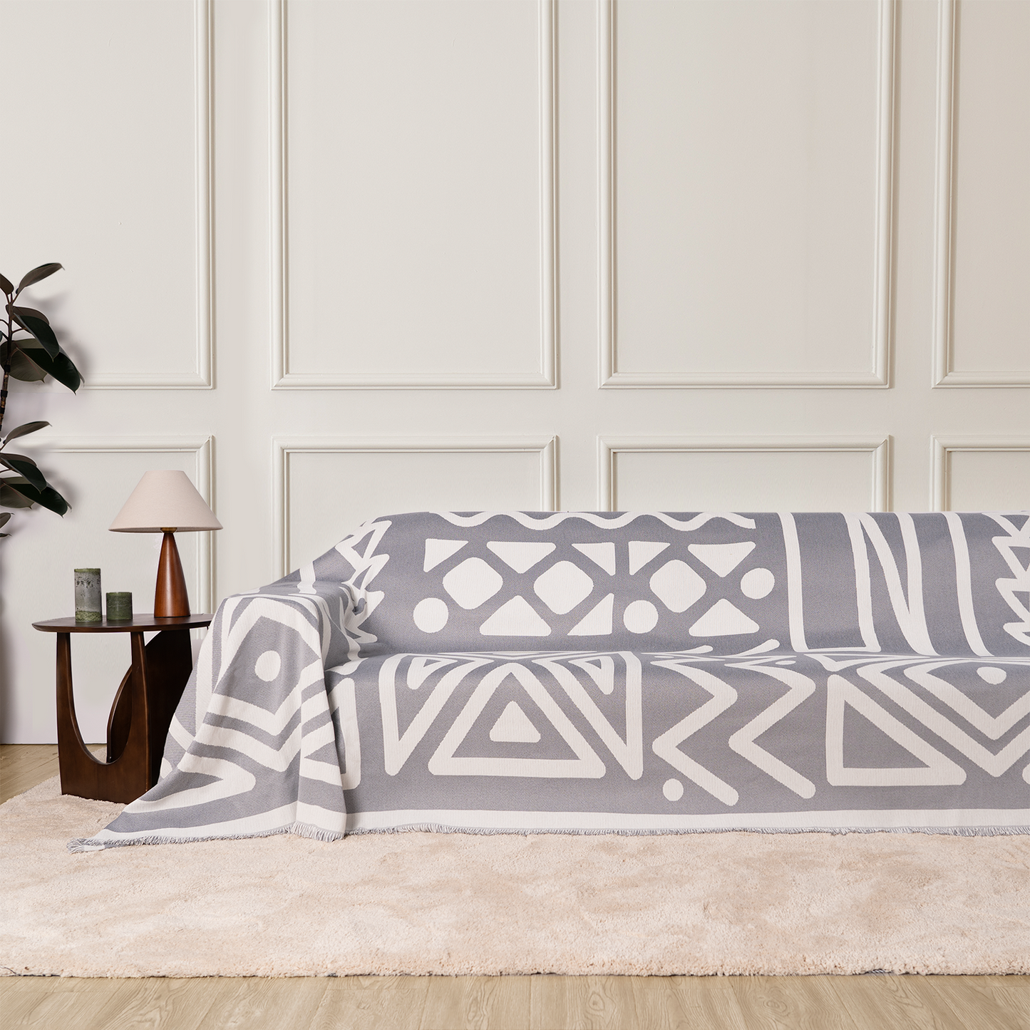 Copridivano d’Ispirazione Boho con Disegni Geometrici e Dettagli Eleganti