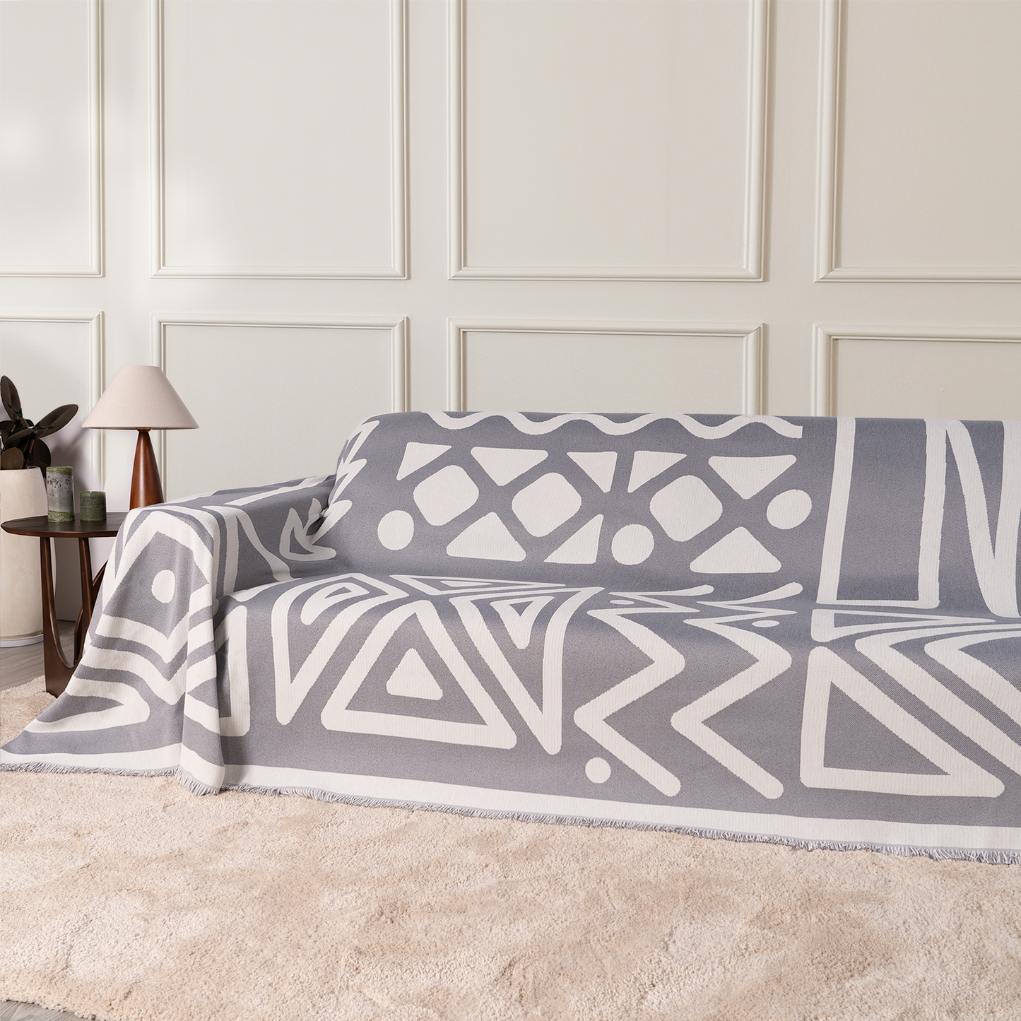 Copridivano d’Ispirazione Boho con Disegni Geometrici e Dettagli Eleganti